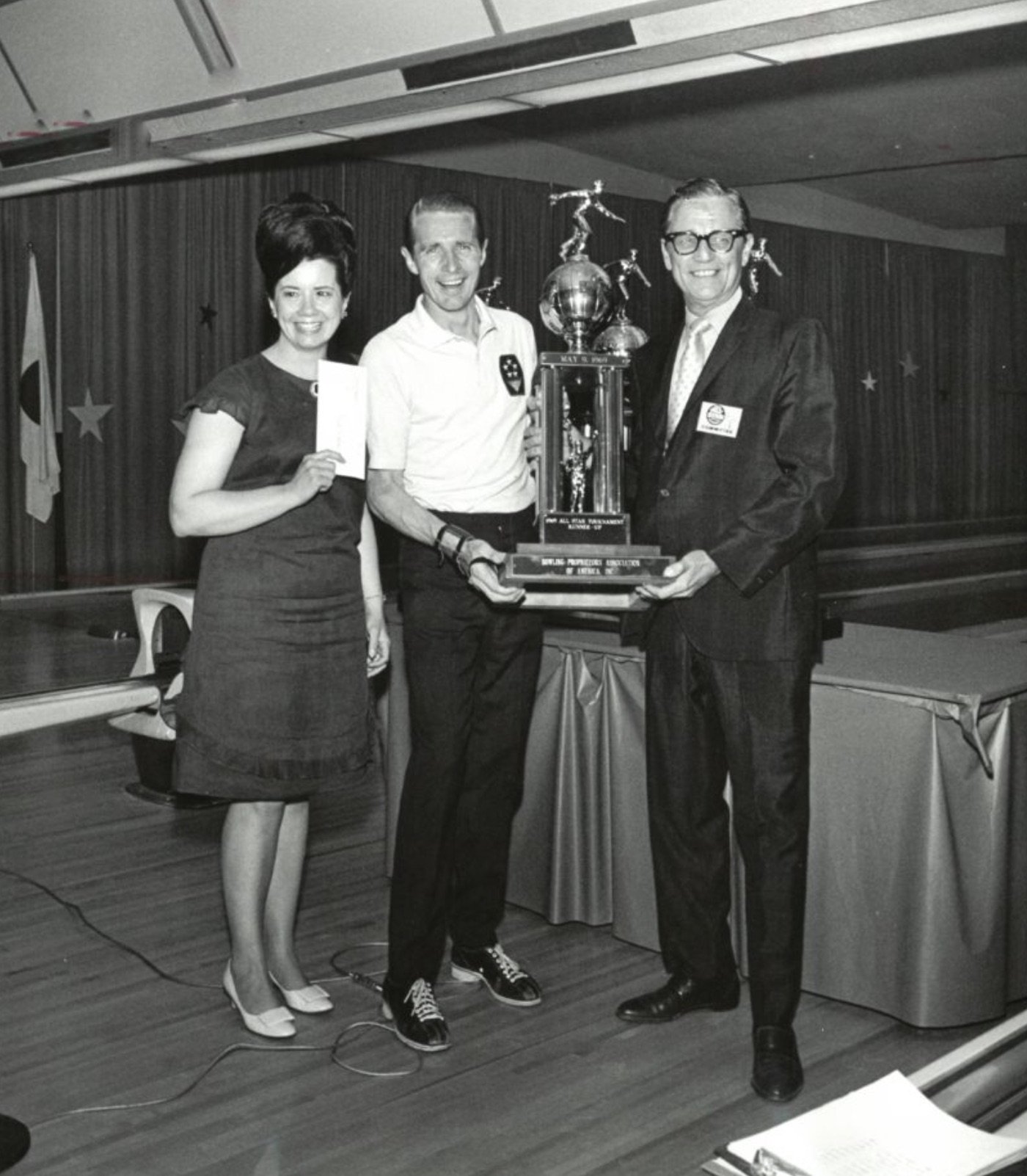 Pro bowler his wife with the BPAA All-Star Tournament trophy 